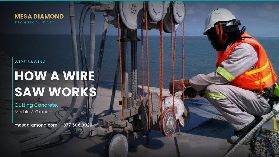 Operator running a diamond wire saw with pulleys on a jobsite