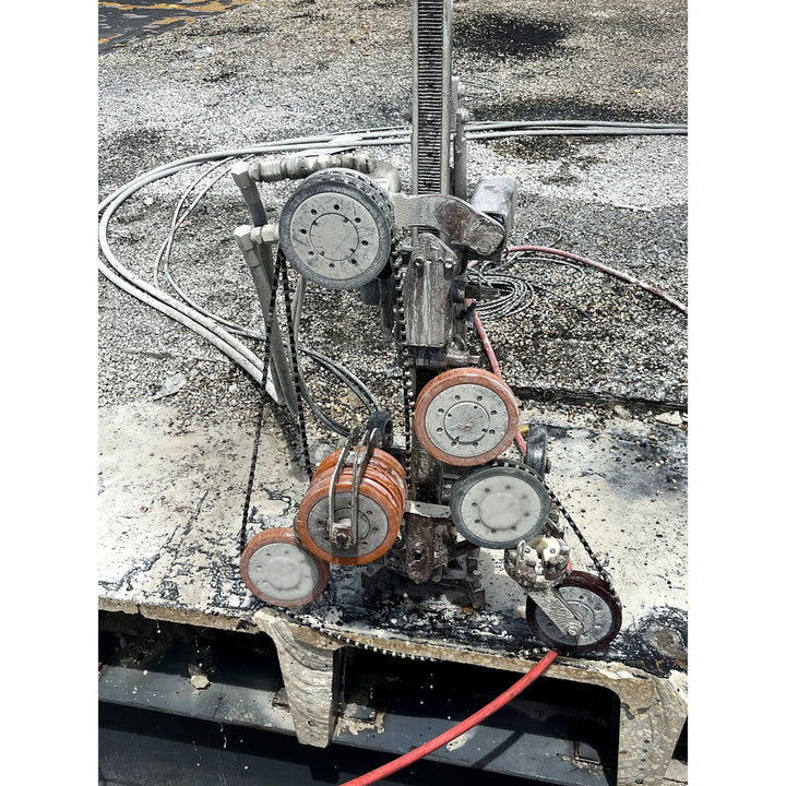 PL200 hard grade rubber lining on wire saw pulleys during a concrete cut