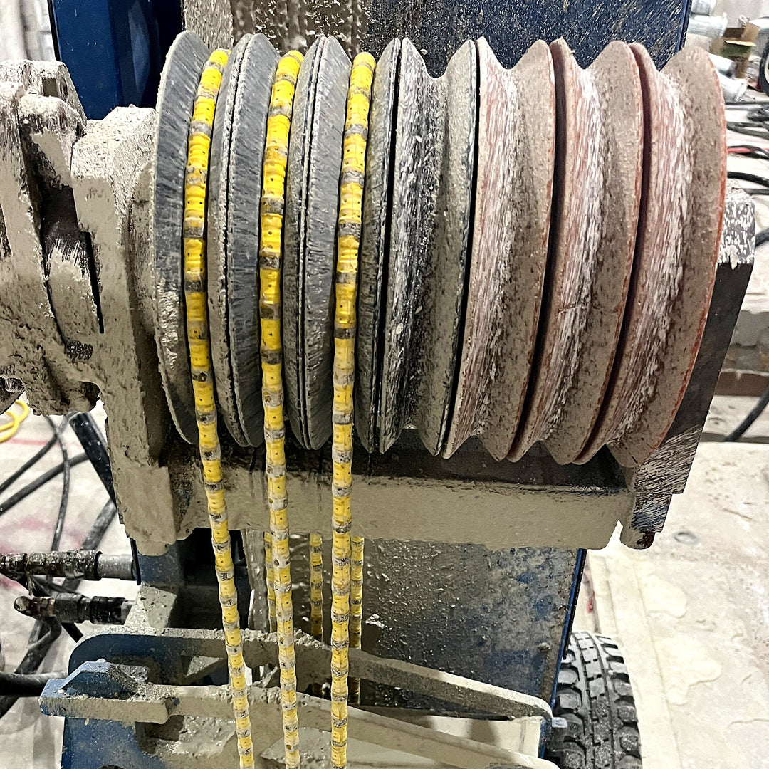 PL200 medium grade rubber lining on a wire saw drive wheel with diamond wire in the grooves